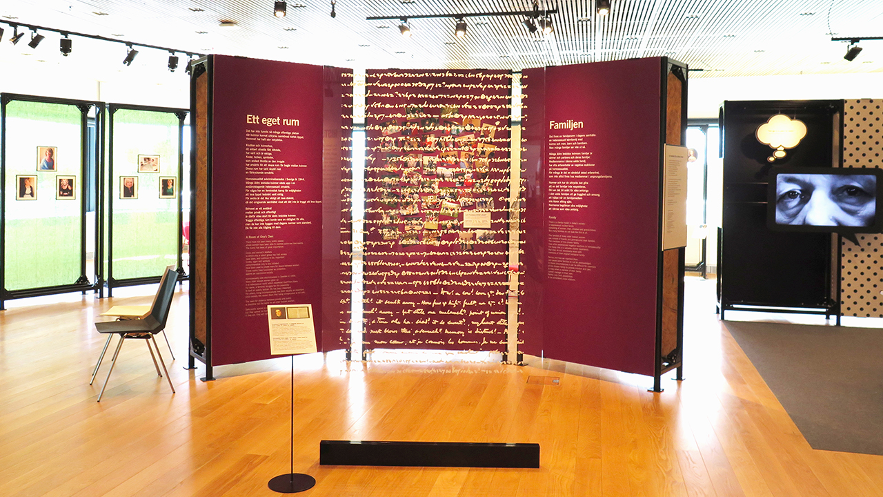 Photo of a plexiglass sheet in the middle of the room with Anne Listers code from 19th century.